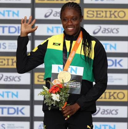 (230826) -- BUDAPEST, Aug. 26, 2023 -- Gold medalist Danielle Williams of Jamaica celebrates during the awarding ceremony for the women s 100 meters hurdles final during the World Athletics Championships in Budapest, Hungary, Aug. 25, 2023. ) (SP)HUNGARY-BUDAPEST-ATHLETICS-WORLD CHAMPIONSHIPS-DAY 7 LixYing 