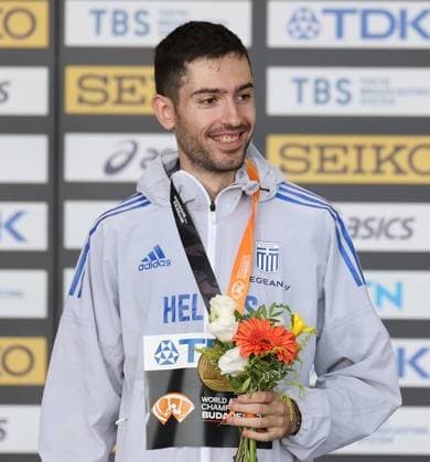 (230826) -- BUDAPEST, Aug. 26, 2023 -- Gold medalist Miltiadis Tentoglou of Greece celebrates during the awarding ceremony for the men s long jump final during the World Athletics Championships in Budapest, Hungary, Aug. 25, 2023. ) (SP)HUNGARY-BUDAPEST-ATHLETICS-WORLD CHAMPIONSHIPS-DAY 7 LixYing 
