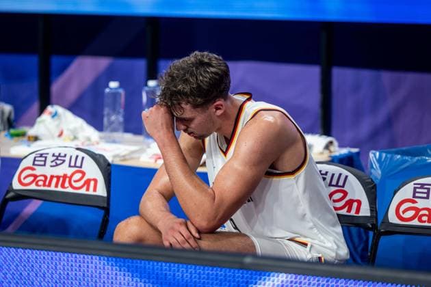 Basketball Okinawa 25 08 2023 FIBA Basketball World Cup 2023 World Cup Men Preliminary Round Germany GER Japan JPN Franz Wagner Germany, No 09 injured down on bench desperately disappointed