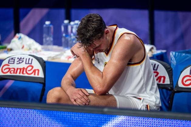 Basketball Okinawa 25 08 2023 FIBA Basketball World Cup 2023 World Cup Men Preliminary Round Germany GER Japan JPN Franz Wagner Germany, No 09 injured down on bench desperately disappointed