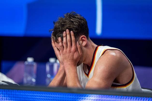Basketball Okinawa 25 08 2023 FIBA Basketball World Cup 2023 World Cup Men Preliminary Round Germany GER Japan JPN Franz Wagner Germany, No 09 injured down on bench desperately disappointed
