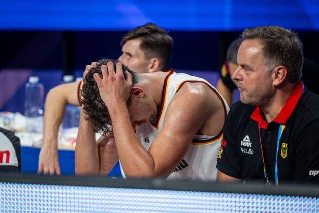 Basketball Okinawa 25 08 2023 FIBA Basketball World Cup 2023 World Cup Men Preliminary Round Germany GER Japan JPN Franz Wagner Germany, No 09 injured down on bench desperately disappointed