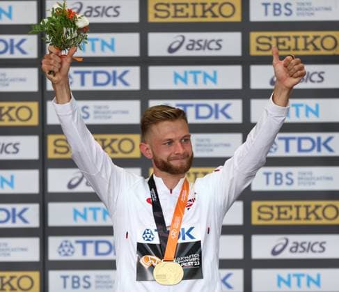 (230826) -- BUDAPEST, Aug. 26, 2023 -- Gold medalist Josh Kerr of Britain celebrates during the awarding ceremony for the men s 1500 meters final during the World Athletics Championships in Budapest, Hungary, Aug. 25, 2023. ) (SP)HUNGARY-BUDAPEST-ATHLETICS-WORLD CHAMPIONSHIPS-DAY 7 LixYing 