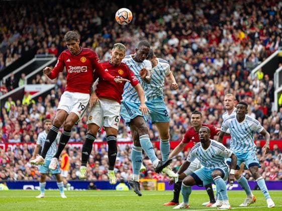 (230826) -- MANCHESTER, Aug. 26, 2023 -- Manchester United, ManU s Raphael Varane (1st L) and Lisandro Martinez (2nd L) challenge for a header together during the FA Premier League match between Manchester United FC and Nottingham Forest FC at Old Trafford in Manchester, Britain, on Aug. 26, 2023. Man Utd won 3-2. FOR EDITORIAL USE ONLY. NOT FOR SALE FOR MARKETING OR ADVERTISING CAMPAIGNS. NO USE WITH UNAUTHORIZED AUDIO, VIDEO, DATA, FIXTURE LISTS, CLUB LEAGUE LOGOS OR LIVE SERVICES. ONLINE IN-MATCH USE LIMITED TO 45 IMAGES, NO VIDEO EMULATION. NO USE IN BETTING, GAMES OR SINGLE CLUB LEAGUE PLAYER PUBLICATIONS. (SP)BRITAIN-MANCHESTER-FOOTBALL-ENGLISH PREMIER LEAGUE-MANCHESTER UNITED FC VS NOTTINGHAM FOREST LixYing