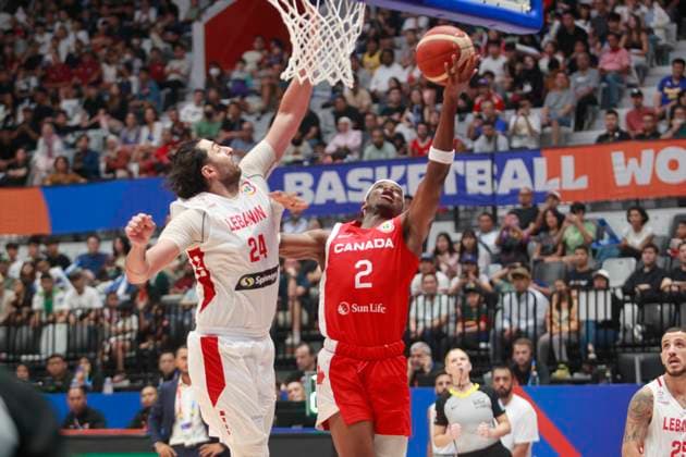JAKARTA, INDONESIA AUGUST 27: Shai Gilgeous-Alexander (C) of Canada challenge by Hayk Gyokchyan of Lebanon on Canada vs Lebanon game during 2023 FIBA Basketball World Cup in Jakarta, Indonesia on August 27, 2023. The 2023 FIBA Basketball World Cup will held on August 25 until September 10, 2023 in Jakarta - Indonesia, Manila - Philipines dan Okinawa Japan. BASKET BALL: Canada vs Liban - Jakarta - Coupe du Monde FIBA - 26 08 2023 YuliSeperi Panoramic 