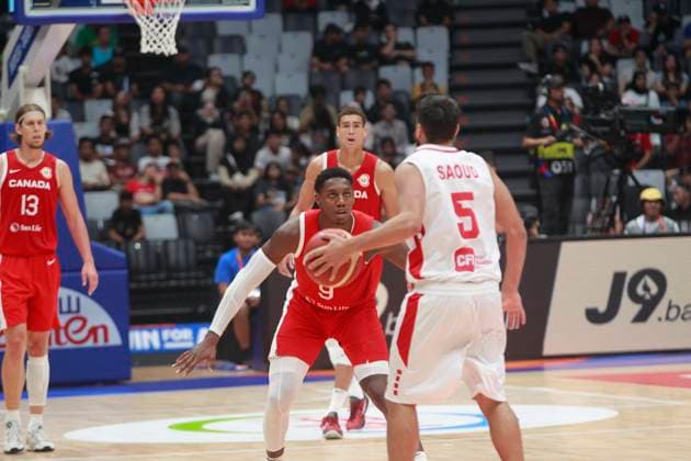 JAKARTA, INDONESIA AUGUST 27: Amir Saoud (R) of Lebanon challenge by Canada players on Canada vs Lebanon game during 2023 FIBA Basketball World Cup in Jakarta, Indonesia on August 27, 2023. The 2023 FIBA Basketball World Cup will held on August 25 until September 10, 2023 in Jakarta - Indonesia, Manila - Philipines dan Okinawa Japan. BASKET BALL: Canada vs Liban - Jakarta - Coupe du Monde FIBA - 26 08 2023 YuliSeperi Panoramic 