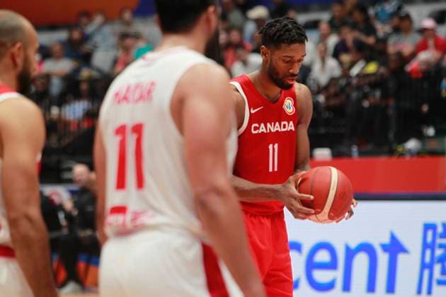 JAKARTA, INDONESIA AUGUST 27: Kyle Alexander of Canada looked a ball before free throw on Canada vs Lebanon game during 2023 FIBA Basketball World Cup in Jakarta, Indonesia on August 27, 2023. The 2023 FIBA Basketball World Cup will held on August 25 until September 10, 2023 in Jakarta - Indonesia, Manila - Philipines dan Okinawa Japan. BASKET BALL: Canada vs Liban - Jakarta - Coupe du Monde FIBA - 26 08 2023 YuliSeperi Panoramic 
