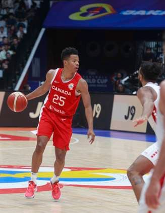 JAKARTA, INDONESIA AUGUST 27: Trae Bell-Haynes of Canada dribling on Canada vs Lebanon game during 2023 FIBA Basketball World Cup in Jakarta, Indonesia on August 27, 2023. The 2023 FIBA Basketball World Cup will held on August 25 until September 10, 2023 in Jakarta - Indonesia, Manila - Philipines dan Okinawa Japan. BASKET BALL: Canada vs Liban - Jakarta - Coupe du Monde FIBA - 26 08 2023 YuliSeperi Panoramic 