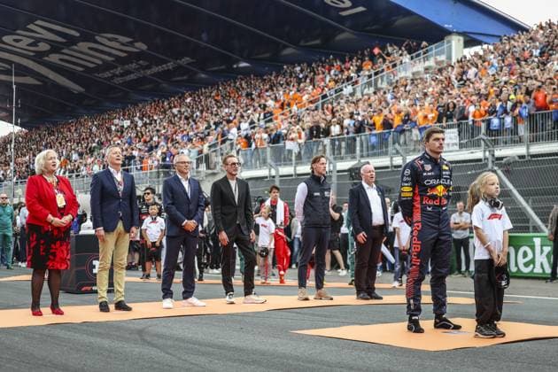 VERSTAPPEN Max (ned), Red Bull Racing RB19, portrait with DOMENICALI Stefano (ita), Chairman and CEO Formula One Group FOG during the dutch hymn prior to the start during the 2023 Formula 1 Heineken Dutch Grand Prix, 13th round of the 2023 Formula One World Championship, WM, Weltmeisterschaft from August 25 to 28, 2023 on the Zandvoort Circuit, in Zandvoort, Netherlands - F1 - DUTCH GRAND PRIX 2023 - RACE DPPI Panoramic  G0OD5588