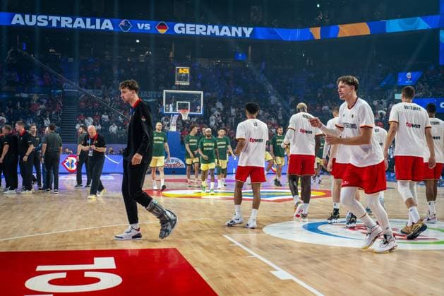 Basketball Okinawa 27 08 2023 FIBA Basketball World Cup 2023 Mens World Cup Preliminary Round Australia AUS Germany GER Franz Wagner Germany, No 09 injured with special shoe cannot participate in game Moritz Wagner Germany, No 13 re