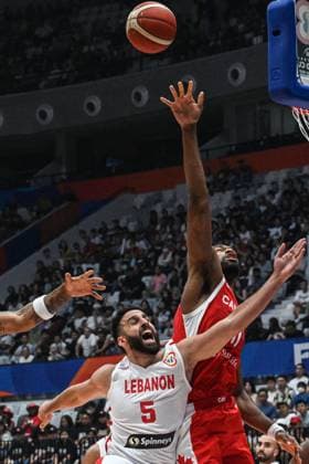 (230827) -- JAKARTA, Aug. 27, 2023 -- Amir Saoud (L) of Lebanon vies for the ball during the Group H match between Lebanon and Canada at the 2023 FIBA World Cup in Jakarta, Indonesia, Aug. 27, 2023. ) (SP)INDONESIA-JAKARTA-BASKETBALL-FIBA WORLD CUP-GROUP H-LBN VS CAN AgungxKuncahyaxB. 