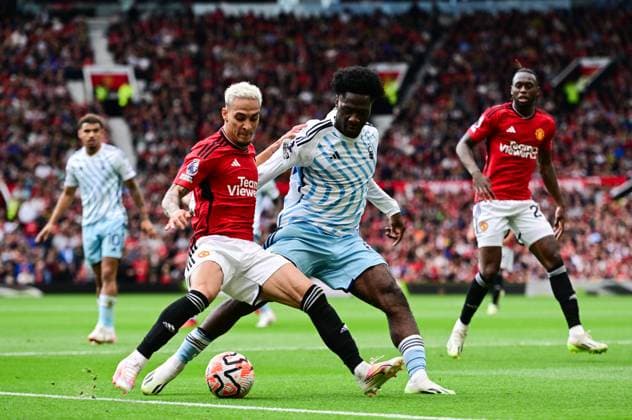 Mandatory Credit: Photo by Greig Cowie Shutterstock (14067993ex) Antony of Manchester United, ManU and Ola Aina of Nottingham Forest Manchester United v Nottingham Forest, Premier League, Football, Old Trafford, Manchester, UK - 26 Aug 2023 EDITORIAL USE ONLY No use with unauthorised audio, video, data, fixture lists, club league logos or live services. Online in-match use limited to 120 images, no video emulation. No use in betting, games or single club league player publications. Manchester United v Nottingham Forest, Premier League, Football, Old Trafford, Manchester, UK - 26 Aug 2023 EDITORIAL USE ONLY No use with unauthorised audio, video, data, fixture lists, club league logos or live services. Online in-match use limited to 120 images, no video emulation. No use in betting, games or single club league player publications. Copyright: xGreigxCowie Shutterstockx 14067993ex