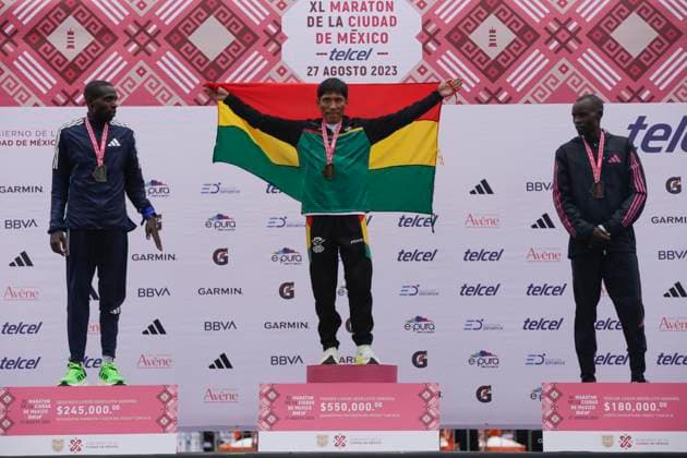 August 28, 2023, Mexico City, Mexico City, Mexico: LEONARD LANGAT of Kenya in second place, HECTOR GARIBAY of Bolivia gold medal and EDWIN KIPROP KIPTOO of Kenya on the podium after finishing the men s race of the Telcel Mexico City Marathon 2023. Mexico City Mexico - ZUMAs310 0302325798st Copyright: xLuisxExSalgadox