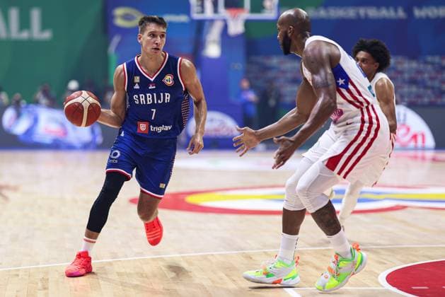 MANILA, PHILIPPINES - AUGUST 28: Bogdan Bogdanovic 7 of Serbia controls the ball during the FIBA Basketball World Cup Group B game between Puerto Rico and Serbia at Araneta Coliseum on August 28, 2023 in Manila, Philippines.  Copyright: xVCGx 111451477767
