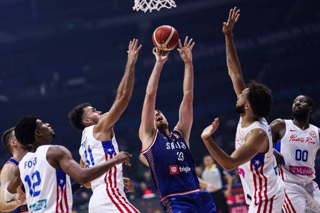 MANILA, PHILIPPINES - AUGUST 28: Nikola Milutinov 33 of Serbia drives to the basket during the FIBA Basketball World Cup Group B game between Puerto Rico and Serbia at Araneta Coliseum on August 28, 2023 in Manila, Philippines.  Copyright: xVCGx 111451477806