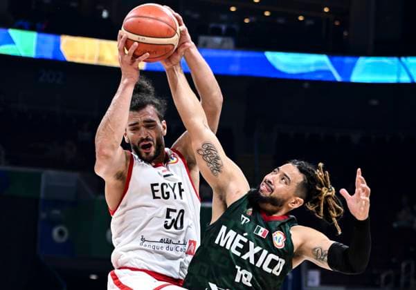 (230829) -- MANILA, Aug. 29, 2023 -- Egypt s Assem Marei (L) competes during the Group D match between Egypt and Mexico at the 2023 FIBA World Cup in Manila, the Philippines, Aug. 29, 2023. ) (SP)PHILIPPINES-MANILA-BASKETBALL-FIBA WORLD CUP-GROUP D-EGY VS MEX HexChangshan 