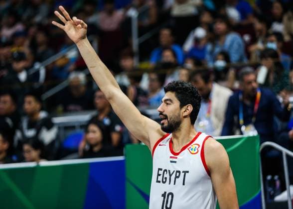 (230829) -- MANILA, Aug. 29, 2023 -- Egypt s Anas Mahmoud celebrates a three pointer from the bench during the Group D match between Egypt and Mexico at the 2023 FIBA World Cup in Manila, the Philippines, Aug. 29, 2023. ) (SP)PHILIPPINES-MANILA-BASKETBALL-FIBA WORLD CUP-GROUP D-EGY VS MEX RouellexUmali 