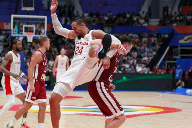 August 29, 2023, Jakarta, Jakarta, Indonesia: JAKARTA, INDONESIA Ã¢â‚¬ AUGUST 29: CanadaÃ¢â‚¬â ¢s Dillon Brooks (C) is challenged by LatviaÃ¢â‚¬â ¢s Rodions Kurcus (L) on Canada vs Latvia game during 2023 FIBA Basketball World Cup in Jakarta, Indonesia on August 29 2023. The 2023 FIBA Basketball World Cup will held on August 25 until September 10, 2023 in Jakarta - Indonesia, Manila - Philipines dan Okinawa Ã¢â‚¬ Japan Jakarta Indonesia - ZUMAys1_ 0302388116st Copyright: xSijorixImagesx