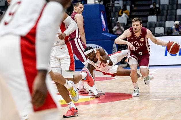 (230830) -- JAKARTA, Aug. 30, 2023 -- Arturs Kurucs of Latvia breaks through during the FIBA World Cup 2023 Group H match between Canada and Latvia in Jakarta, Indonesia, on Aug. 29, 2023. ) (SP)INDONESIA-JAKARTA-FIBA BASKETBALL-WORLD CUP 2023-GROUP H-CAN VS LAT AgungxKuncahyaxB. 