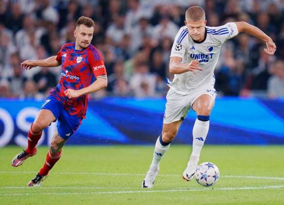 FCK s Andreas Cornelius and Rakow Czestochowa s Fran Tudor after the Champions League match between FC Copenhagen and Rakow Czestochowa at Parken in Copenhagen on Wednesday, August 30, 2023 Photo Liselotte Sabroe Ritzau Scanpix , Copenhagen Denmark  Copyright: Ritzau Scanpix LiselottexSabroex COP14288 spdk20230830-234058-L