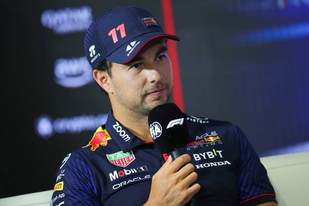 PEREZ Sergio (mex), Red Bull Racing RB19, portrait during the 2023 Formula 1 Pirelli Grand Premio d™Italia Grand Prix, 14th round of the 2023 Formula One World Championship, WM, Weltmeisterschaft from September 1 to 3, 2023 on the Autodromo Nazionale di Monza, in Monza, Italy - F1 - ITALIAN GRAND PRIX 2023 DPPI Panoramic  00123032_EAR34778