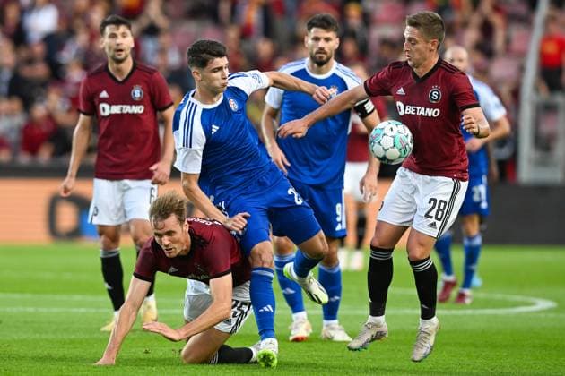 Sparta Praha v Dinamo Zagreb - UEFA Europa League Play Off Round: Second Leg Asger Sorensen and Tomas Wiesner of Sparta Praha competes for the ball with Antonio Marin of Dinamo Zagreb during the UEFA Europa League Play Off Round Second Leg match between Sparta Praha and Dinamo Zagreb at Letna Stadium on August 31, 2023 in Prague, Czech Republic. MarkoxLukunic PIXSELL