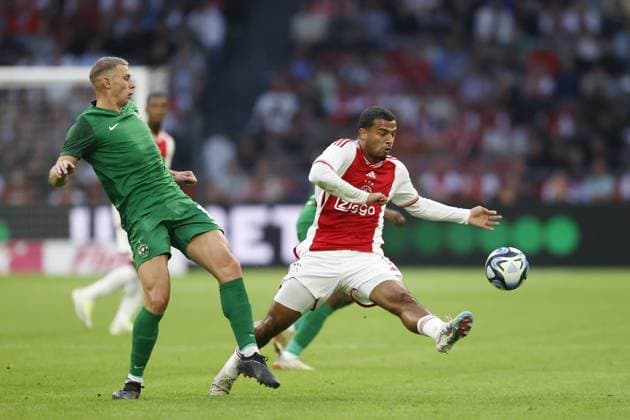 AMSTERDAM , 31-08-2023 , Johan Cruijff Arena , UEFA Europa League season 2023 2024 , Play-offs 2nd leg , match between Ajax and Ludogorets , (L-R) Ludogorets Razgrad player Jakub Piotrowski, Ajax player Owen Wijndal Ajax - Ludogorets  x22143922x Copyright: