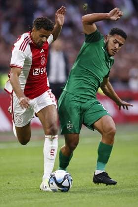 AMSTERDAM - (l-r) Devyne Rensch of Ajax, Caio Vidal Rocha of PFK Ludogorets 1945 during the UEFA Europa League play-offs match between Ajax Amsterdam and PFC Ludogorets at Johan Cruijff ArenA on August 31, 2023 in Amsterdam, Netherlands. ANP MAURICE VAN STONE UEFA Champions League - Play-Offs Second Leg 2023 2024 xVIxANPxSportx xxANPxIVx 476846579 originalFilename: 476846579.jpg