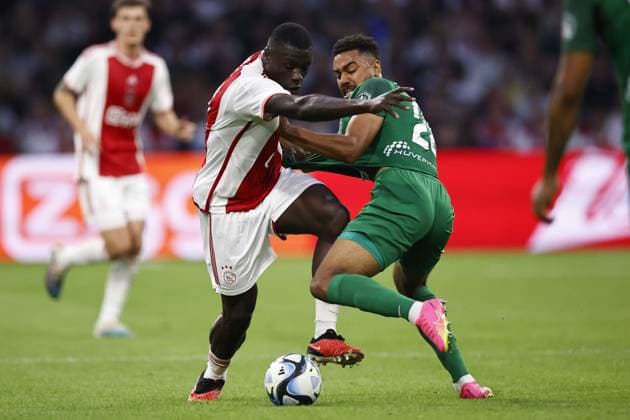 AMSTERDAM - (l-r) Brian Brobbey of Ajax, Noah Sonko-Sundberg of PFK Ludogorets 1945 during the UEFA Europa League play-offs match between Ajax Amsterdam and PFC Ludogorets at the Johan Cruijff ArenA on August 31, 2023 in Amsterdam, Netherlands. ANP MAURICE VAN STONE UEFA Champions League - Play-Offs Second Leg 2023 2024 xVIxANPxSportx xxANPxIVx 476847061 originalFilename: 476847061.jpg