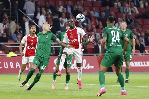 AMSTERDAM , 31-08-2023 , Johan Cruijff Arena , UEFA Europa League season 2023 2024 , Play-offs 2nd leg , match between Ajax and Ludogorets , (L-R) Ludogorets Razgrad player Marcel Heister, Ajax player Carlos Forbs Ajax - Ludogorets  x22143974x Copyright: