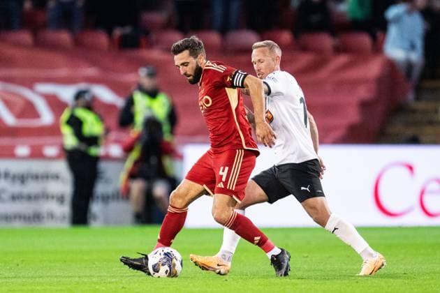 230831 Aberdeens Graeme Shinnie and Häckens Mikkel Rygaard Jensen during the UEFA Europa League play off between Aberdeen and Häcken on August 31, 2023 in Aberdeen Photo Daniel Stiller BILDBYRAN code DS DS0328 football soccer football uefa europa league aberdeen häcken bbeng bbauto  Copyright: DANIELxSTILLER BB230831DS017