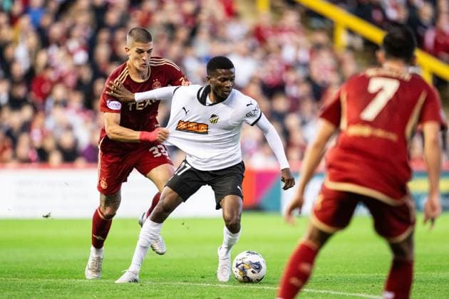 230831 Slobodan Rubezic of Aberdeen and Akoua Romeo Amane during the UEFA Europa League play off between Aberdeen and Häcken on August 31, 2023 in Aberdeen Photo Daniel Stiller BILDBYRAN code DS DS0328 football soccer football uefa europa league aberdeen häcken bbeng  Copyright: DANIELxSTILLER BB230831DS018