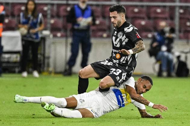 Dutch Janis Boonstra and Union s Loic Lapoussin fight for the ball during a soccer match between Swiss FC Lugano and Belgian Royale Union Saint-Gilloise, Thursday 31 August 2023 in Geneva, Switzerland, the return leg of the play-off for the UEFA Europa League competition. LAURIExDIEFFEMBACQ  x73074327x