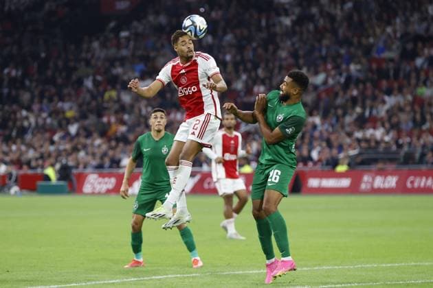 AMSTERDAM , 31-08-2023 , Johan Cruijff Arena , UEFA Europa League season 2023 2024 , Play-offs 2nd leg , match between Ajax and Ludogorets , (L-R) Ajax player Devyne Rensch, Ludogorets Razgrad player Noah Sundberg Ajax - Ludogorets  x22144966x Copyright: