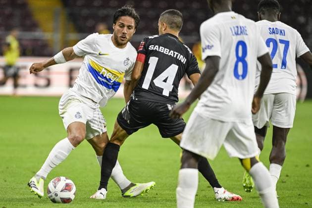 Union s Kevin Mac Allister and Lugano s Jonathan Sabbatini fight for the ball during a soccer match between Swiss FC Lugano and Belgian Royale Union Saint-Gilloise, Thursday 31 August 2023 in Geneva, Switzerland, the return leg of the play-off for the UEFA Europa League competition. LAURIExDIEFFEMBACQ  x73077850x