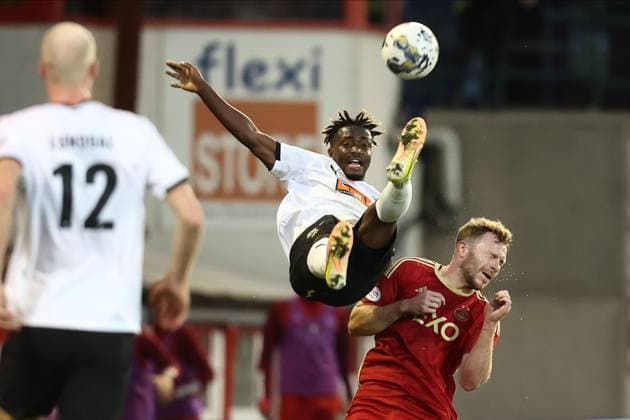 Aberdeen v BK Hacken Europa League 31 08 2023. Play Off BK Hacken™s Ibrahim Sadiq (37) and Nicky Devlin (2) of Aberdeen during the Europa League play off match between Aberdeen and BK Hacken at Pittodrie Stadium, Aberdeen, Scotland on 31 August 2023. Aberdeen Pittodrie Stadium Aberdeenshire Scotland Editorial use only , Copyright: xStephenxDobsonx PSI-17931-0029