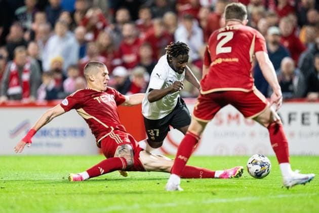 230831 Aberdeens Slobodan Rubezic and Häckens Ibrahim Sadiq during the UEFA Europa League play off between Aberdeen and Häcken on August 31, 2023 in Aberdeen Photo Daniel Stiller BILDBYRAN kod DS DS0328 fotboll football soccer fotball uefa europa league aberdeen häcken bbeng bbauto  Copyright: DANIELxSTILLER BB230831DS046