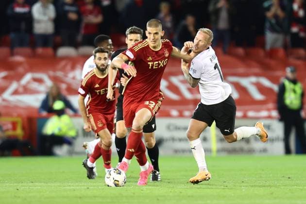 Aberdeen v BK Hacken Europa League 31 08 2023. Play Off Slobodan Rubezic (33) of Aberdeen and BK Hacken™s Mikkel Rygaard (18) during the Europa League play off match between Aberdeen and BK Hacken at Pittodrie Stadium, Aberdeen, Scotland on 31 August 2023. Aberdeen Pittodrie Stadium Aberdeenshire Scotland Editorial use only , Copyright: xStephenxDobsonx PSI-17931-0059