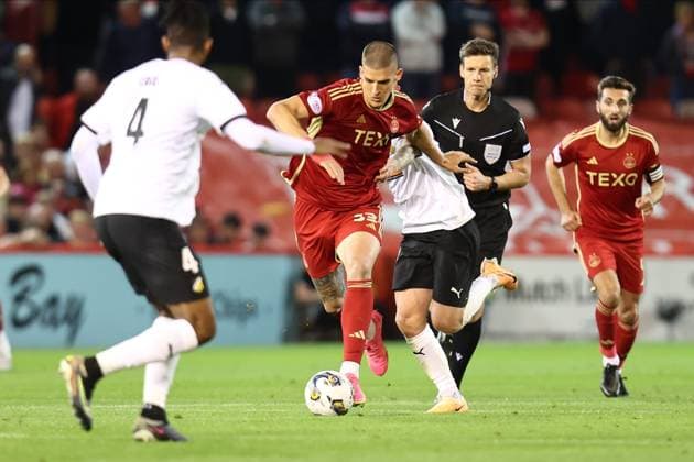 Aberdeen v BK Hacken Europa League 31 08 2023. Play Off Slobodan Rubezic (33) of Aberdeen and BK Hacken™s Mikkel Rygaard (18) during the Europa League play off match between Aberdeen and BK Hacken at Pittodrie Stadium, Aberdeen, Scotland on 31 August 2023. Aberdeen Pittodrie Stadium Aberdeenshire Scotland Editorial use only , Copyright: xStephenxDobsonx PSI-17931-0060