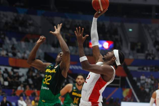 JAKARTA, INDONESIA SEPTEMBER 1: Canada™s Shai Gilgeous-Alexander shoot a ball on Canada vs Brazil game during 2023 FIBA Basketball World Cup in Jakarta, Indonesia on September 1, 2023. The 2023 FIBA Basketball World Cup held on August 25 until September 10, 2023 in Jakarta - Indonesia, Manila - Philipines dan Okinawa Japan. BASKET BALL : Canada vs Bresil - FIBA Coupe du monde - Jakarta - 01 09 2023 YuliSeperi Panoramic 