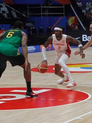 JAKARTA, INDONESIA SEPTEMBER 1: Canada™s Shai Gilgeous-Alexander dribbling a ball on Canada vs Brazil game during 2023 FIBA Basketball World Cup in Jakarta, Indonesia on September 1, 2023. The 2023 FIBA Basketball World Cup held on August 25 until September 10, 2023 in Jakarta - Indonesia, Manila - Philipines dan Okinawa Japan. BASKET BALL : Canada vs Bresil - FIBA Coupe du monde - Jakarta - 01 09 2023 YuliSeperi Panoramic 