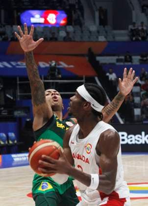 JAKARTA, INDONESIA SEPTEMBER 1: Canada™s Shai Gilgeous-Alexander dribbling a ball on Canada vs Brazil game during 2023 FIBA Basketball World Cup in Jakarta, Indonesia on September 1, 2023. The 2023 FIBA Basketball World Cup held on August 25 until September 10, 2023 in Jakarta - Indonesia, Manila - Philipines dan Okinawa Japan. BASKET BALL : Canada vs Bresil - FIBA Coupe du monde - Jakarta - 01 09 2023 YuliSeperi Panoramic 