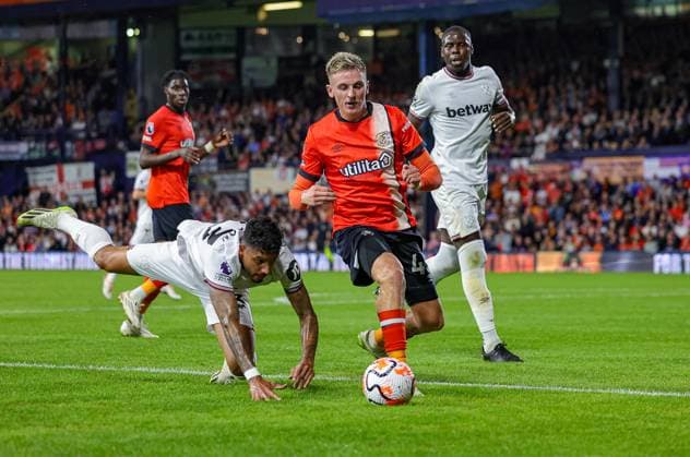 Luton Town v West Ham United Premier League 01 09 2023. Alfie Doughty (45) of Luton Town battles with Lucas Paqueta (10) of West Ham United during the Premier League match between Luton Town and West Ham United at Kenilworth Road, Luton, England on 1 September 2023. Editorial use only DataCo restrictions apply See www.football-dataco.com , Copyright: xNigelxKeenex PSI-17963-0041