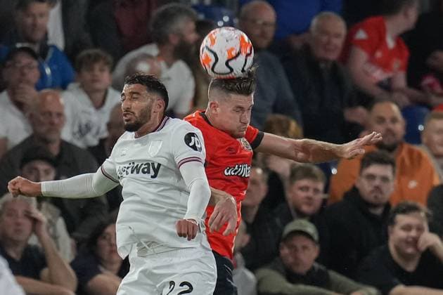 Said Benrahma (22) of West Ham United and Reece Burke (16) of Luton Town during the Premier League match between Luton Town and West Ham United at Kenilworth Road, Luton, England on 1 September 2023. Copyright: xDavidxHornx PMI-5742-0092