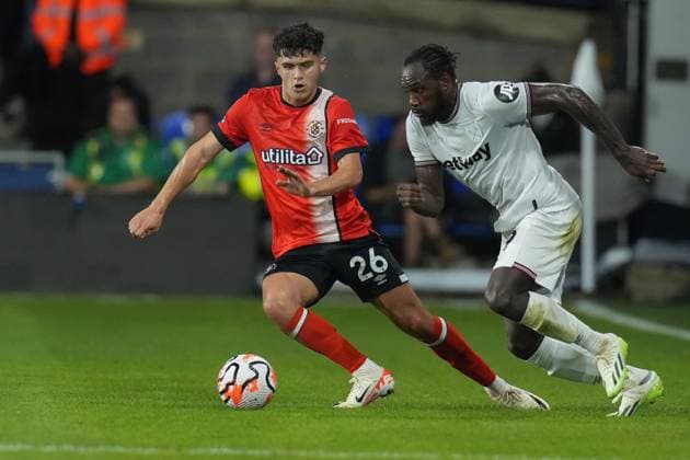 Ryan Giles (26) of Luton Town and Michail Antonio (9) of West Ham United during the Premier League match between Luton Town and West Ham United at Kenilworth Road, Luton, England on 1 September 2023. Copyright: xDavidxHornx PMI-5742-0111