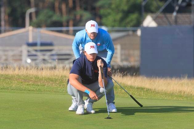 2nd September 2023; Old Course at St Andrews, St Andrews, Fife, Scotland; Walker Cup, Great Britain and Ireland versus USA, First Round; Alex Maguire and James Ashfield of Great Britain and Ireland line up a putt on the first green on the Old Course, St Andrews, during their foursomes match  ActionPlus12549254 DavidxYoung