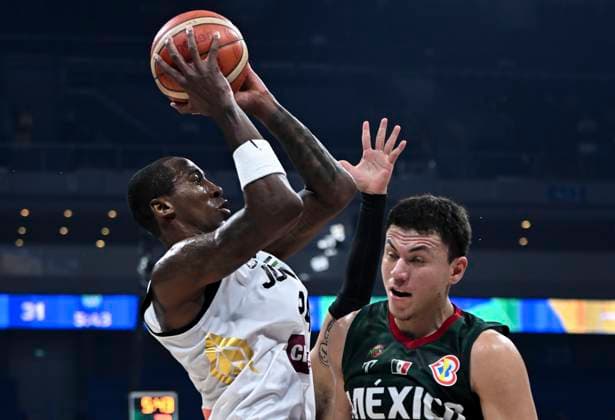 (230902) -- MANILA, Sept. 2, 2023 -- Rondae Hollis-Jefferson (L) of Jordan shoots during the classification round 17-32 match between Jordan and Mexico at the 2023 FIBA World Cup in Manila, the Philippines, Sept. 2, 2023. ) (SP)PHILIPPINES-MANILA-BASKETBALL-FIBA WORLD CUP-CLASSIFICATION ROUND-MEX VS JOR HexChangshan 