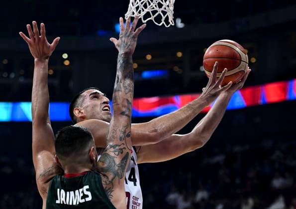 (230902) -- MANILA, Sept. 2, 2023 -- Ahmad Dwairi (R) of Jordan goes for a lay-up during the classification round 17-32 match between Jordan and Mexico at the 2023 FIBA World Cup in Manila, the Philippines, Sept. 2, 2023. ) (SP)PHILIPPINES-MANILA-BASKETBALL-FIBA WORLD CUP-CLASSIFICATION ROUND-MEX VS JOR HexChangshan 
