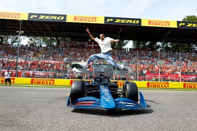 Formula 1, Italian GP in Monza, high jumper Gianmarco Tamberi jumps over race car
