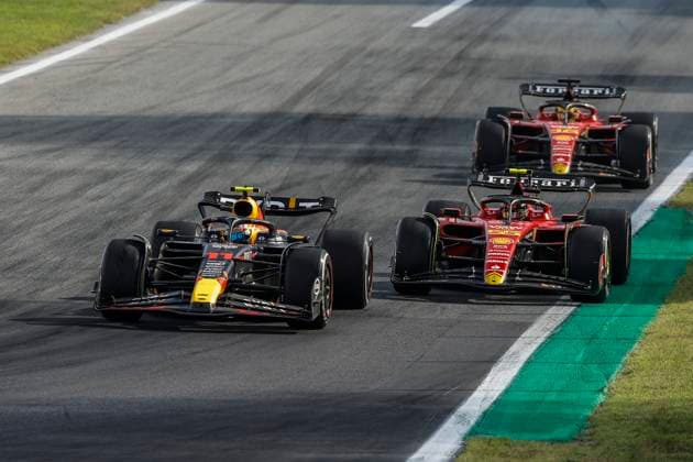 11 PEREZ Sergio (mex), Red Bull Racing RB19, action 55 SAINZ Carlos (spa), Scuderia Ferrari SF-23, action 16 LECLERC Charles (mco), Scuderia Ferrari SF-23, action during the 2023 Formula 1 Pirelli Grand Premio d™Italia Grand Prix, 14th round of the 2023 Formula One World Championship, WM, Weltmeisterschaft from September 1 to 3, 2023 on the Autodromo Nazionale di Monza, in Monza, Italy - F1 - ITALIAN GRAND PRIX 2023 - RACE DPPI Panoramic 00123033__R3_0707